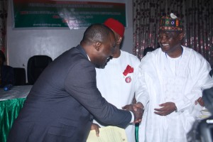 Dr Odimegwu receives a handshake from Dr DanAzumi Ibrahim Director General NOTAP